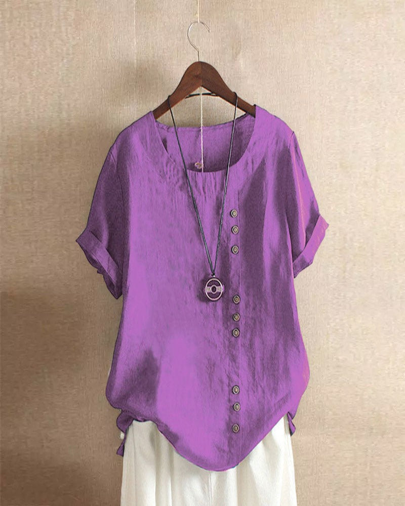 "Asymmetrische linnen blouse met moderne knopen, lichtgroen, ideaal voor casual en chique gelegenheden, stijlvolle look."