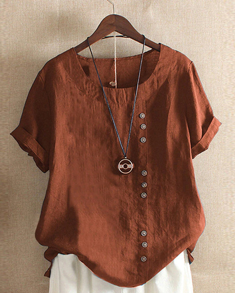 "Asymmetrische linnen blouse met moderne knopen, lichtgroen, ideaal voor casual en chique gelegenheden, stijlvolle look."