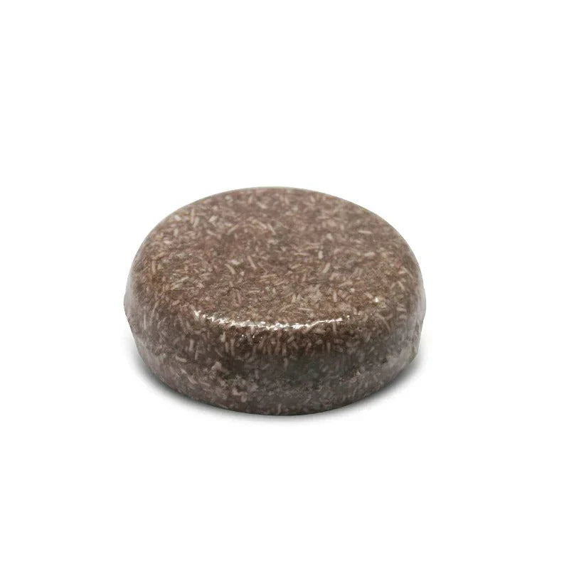"Biologische haarverduistering shampoo; compacte bar, donkerder en voller haar, groene verpakking, natuurlijke haarverzorging