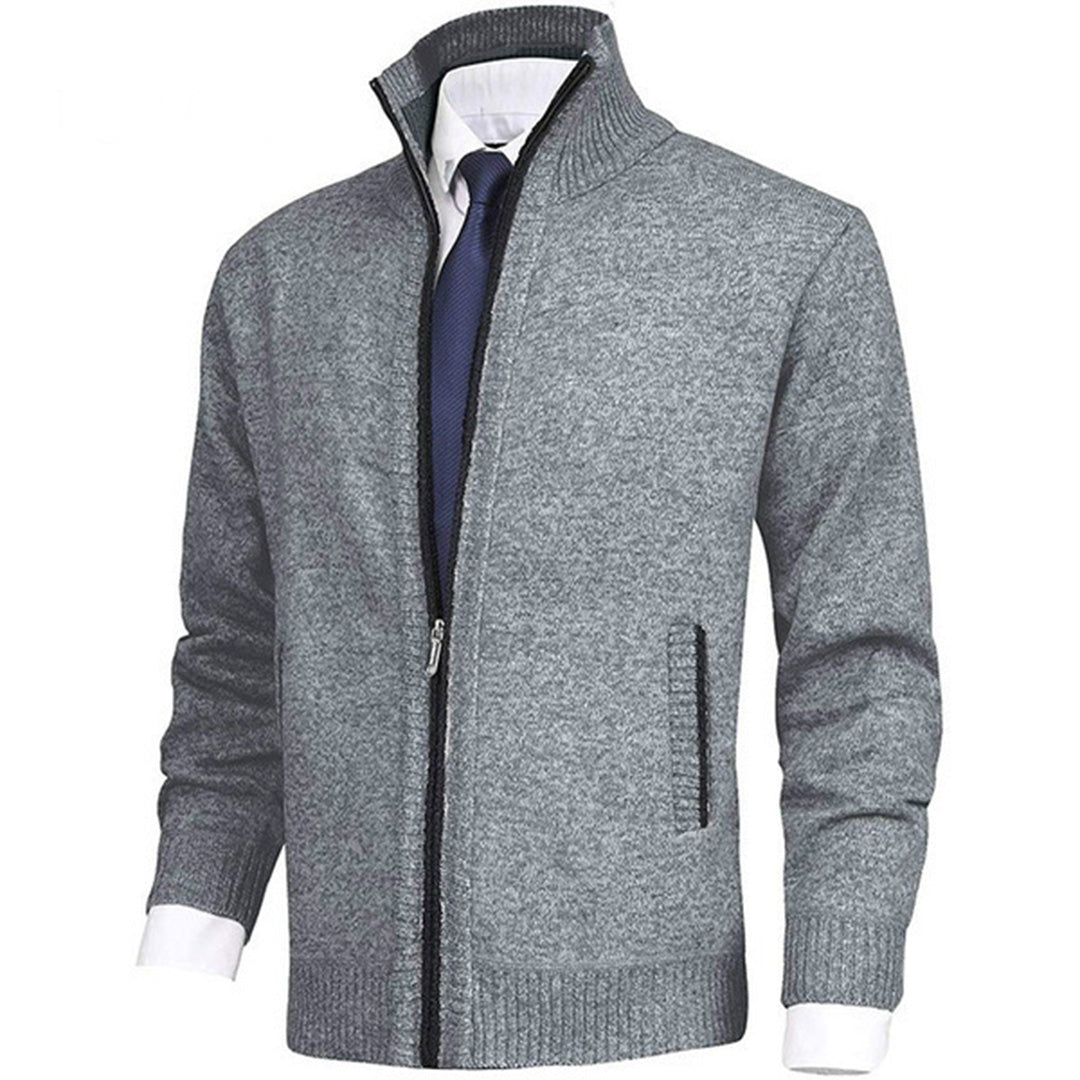 "Blauw herenvest van hoogwaardige fleece met rits en hoge kraag, perfect voor lente. Warm en veelzijdig ontwerp."