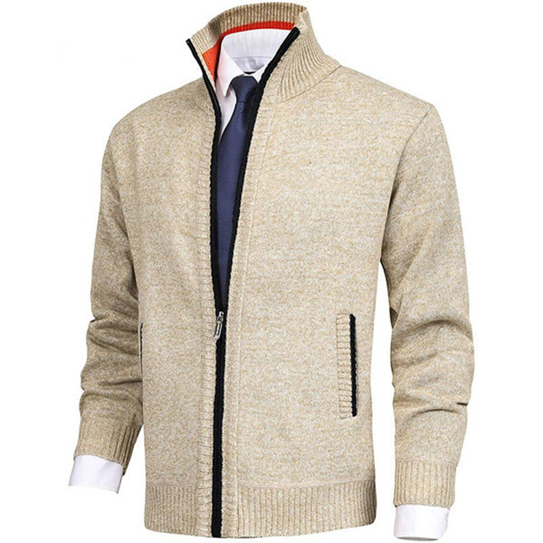 "Blauw herenvest van hoogwaardige fleece met rits en hoge kraag, perfect voor lente. Warm en veelzijdig ontwerp."
