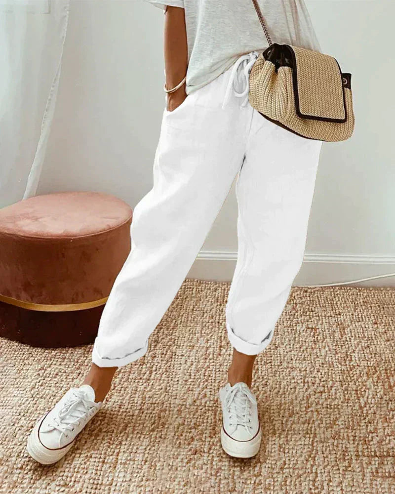"Casual linnen broek voor dames, comfortabel en stijlvol, beige kleur, flatterend silhouet voor elke gelegenheid."