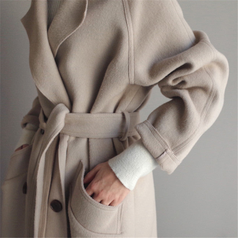 Casual wollen damesjas Isabella, lange pasvorm, rijke kleuren, elegante uitstraling, ideaal voor warme stijl op koude dagen.
