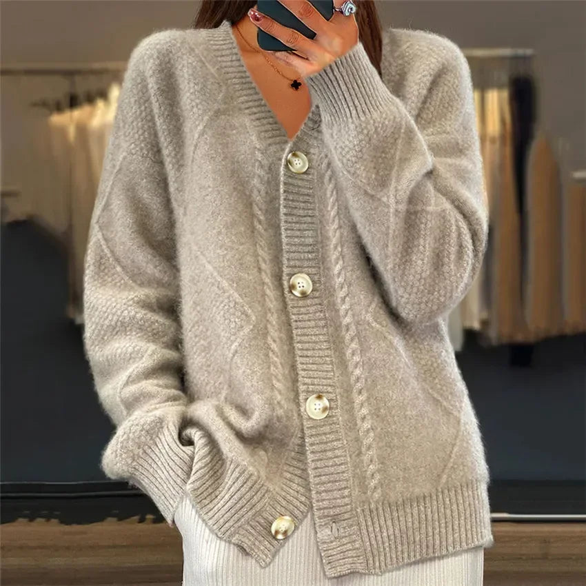 Chique kasjmier vrouwen vest met knoopsluiting, lange mouwen; stijlvol en veelzijdig voor elke gelegenheid.
