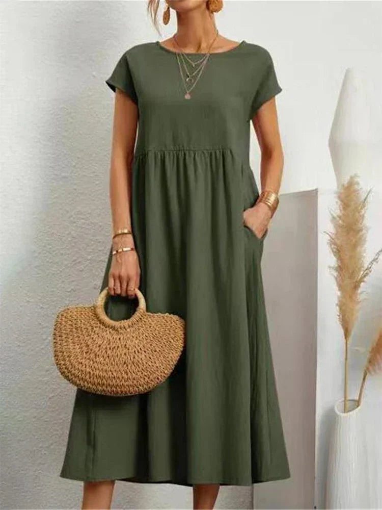 "Comfortabele vintage O-hals zomerjurk van ademend katoen, ideaal voor zomerse dagen; veelzijdige elegante stijl."
