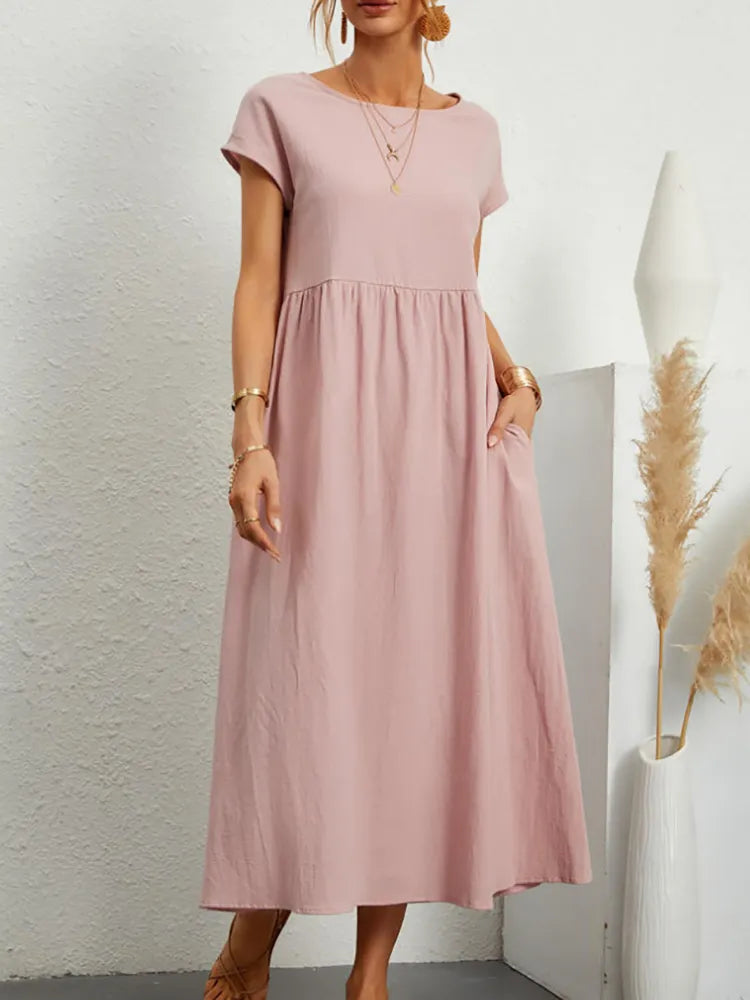 "Comfortabele vintage O-hals zomerjurk van ademend katoen, ideaal voor zomerse dagen; veelzijdige elegante stijl."