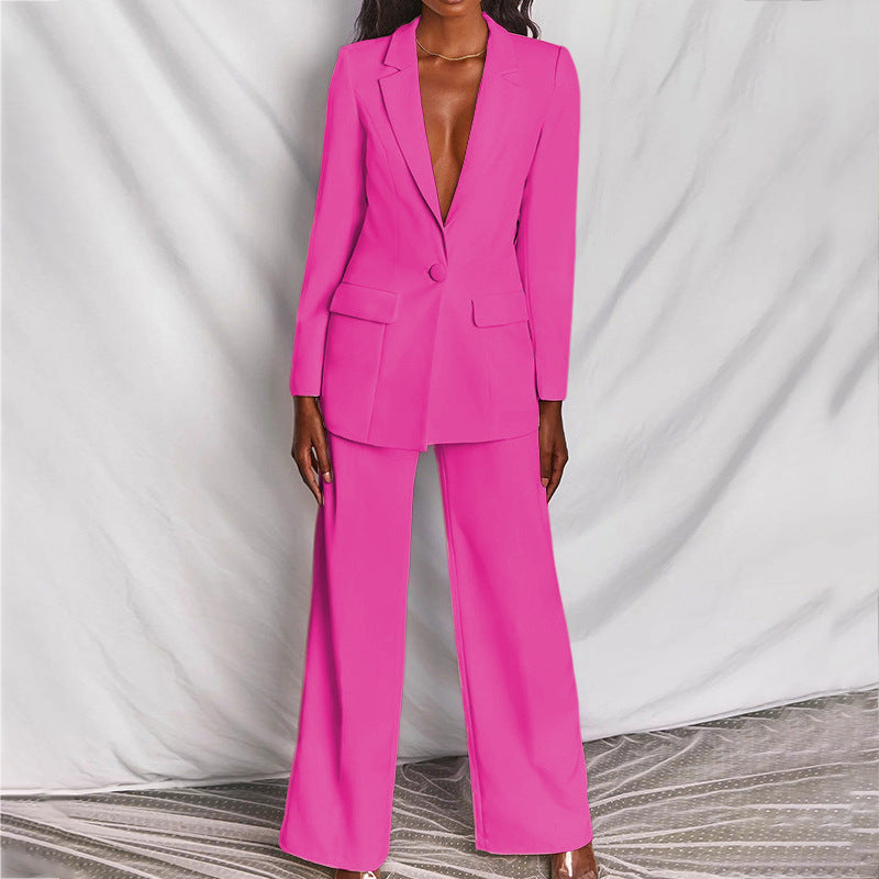 "Dames blazer en broek set in levendige kleuren, elegante snit, perfect voor zakelijke en formele gelegenheden"