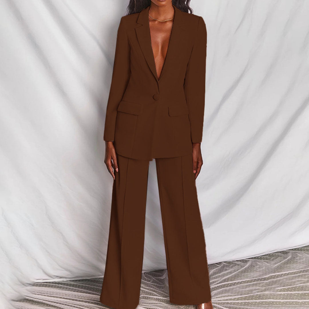 "Dames blazer en broek set in levendige kleuren, elegante snit, perfect voor zakelijke en formele gelegenheden"