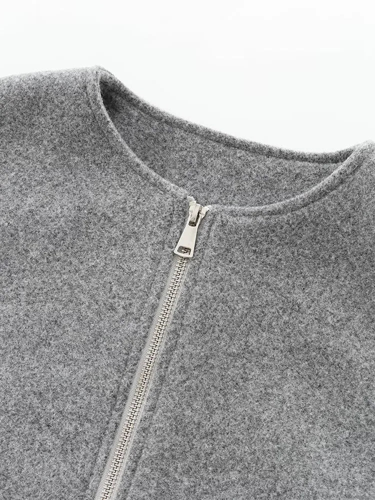 "Dames grijze bomberjas met ritssluiting, elastische tailleband en moderne oversized fit voor een stijlvolle casual look."