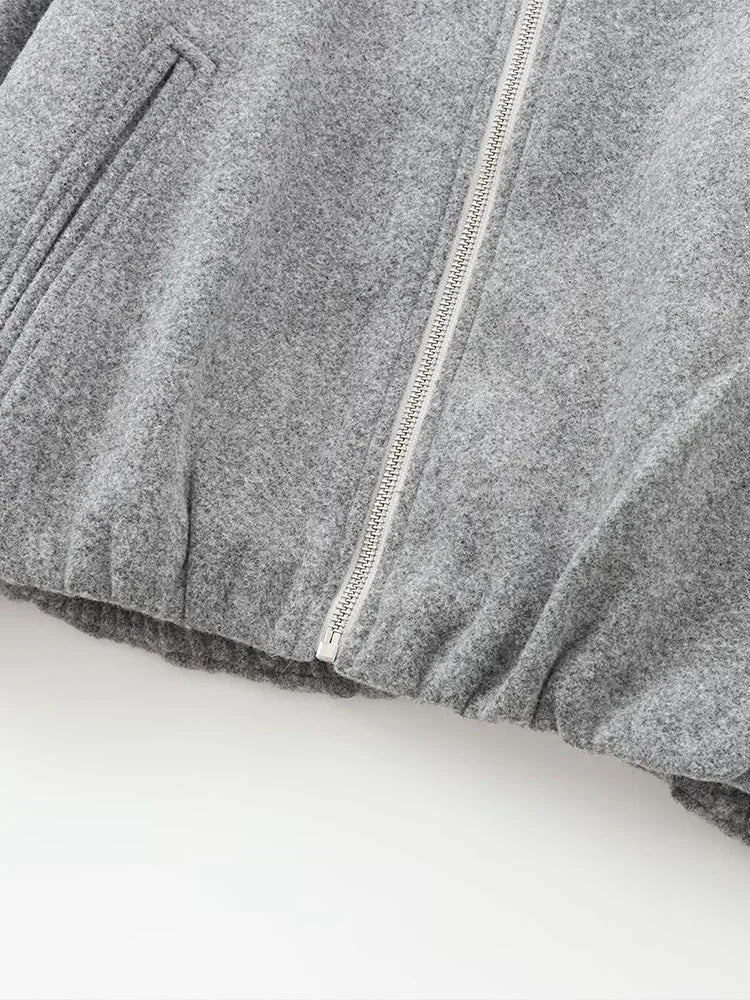 "Dames grijze bomberjas met ritssluiting, elastische tailleband en moderne oversized fit voor een stijlvolle casual look."