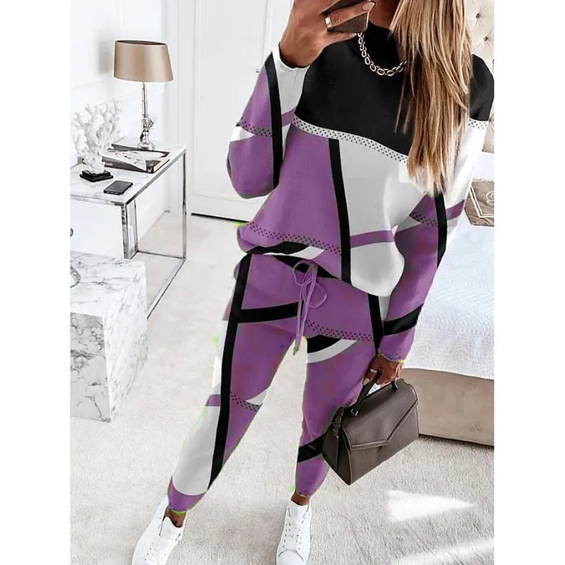 "Dames trainingspak met geometrisch patroon, relaxte pasvorm, ademend materiaal, ideaal voor casual en actieve styling."