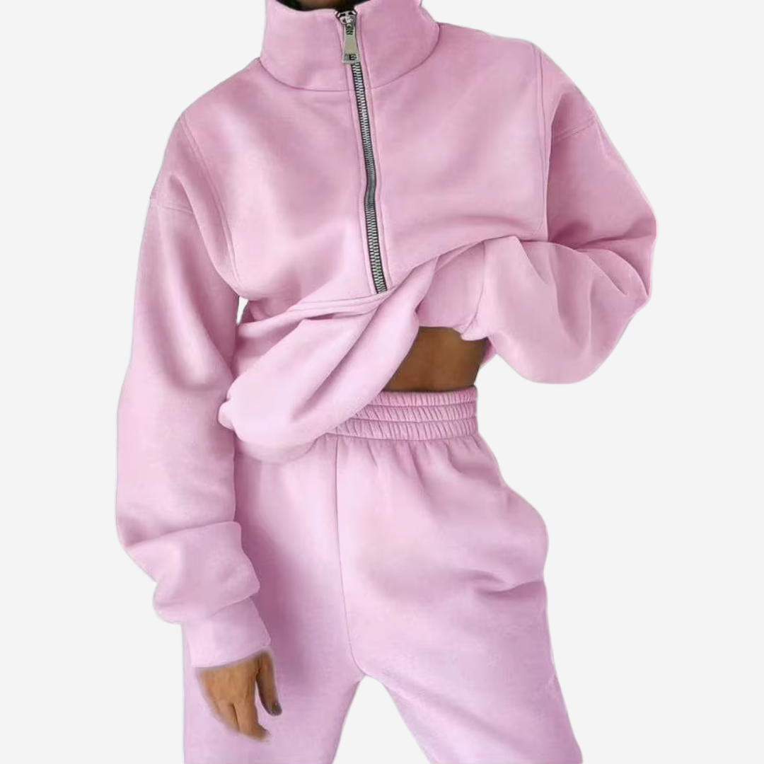 "Dames tweedelig trainingspak: elegante sweater, hoge taille broek, comfortabele pasvorm, ideaal voor casual stijl."