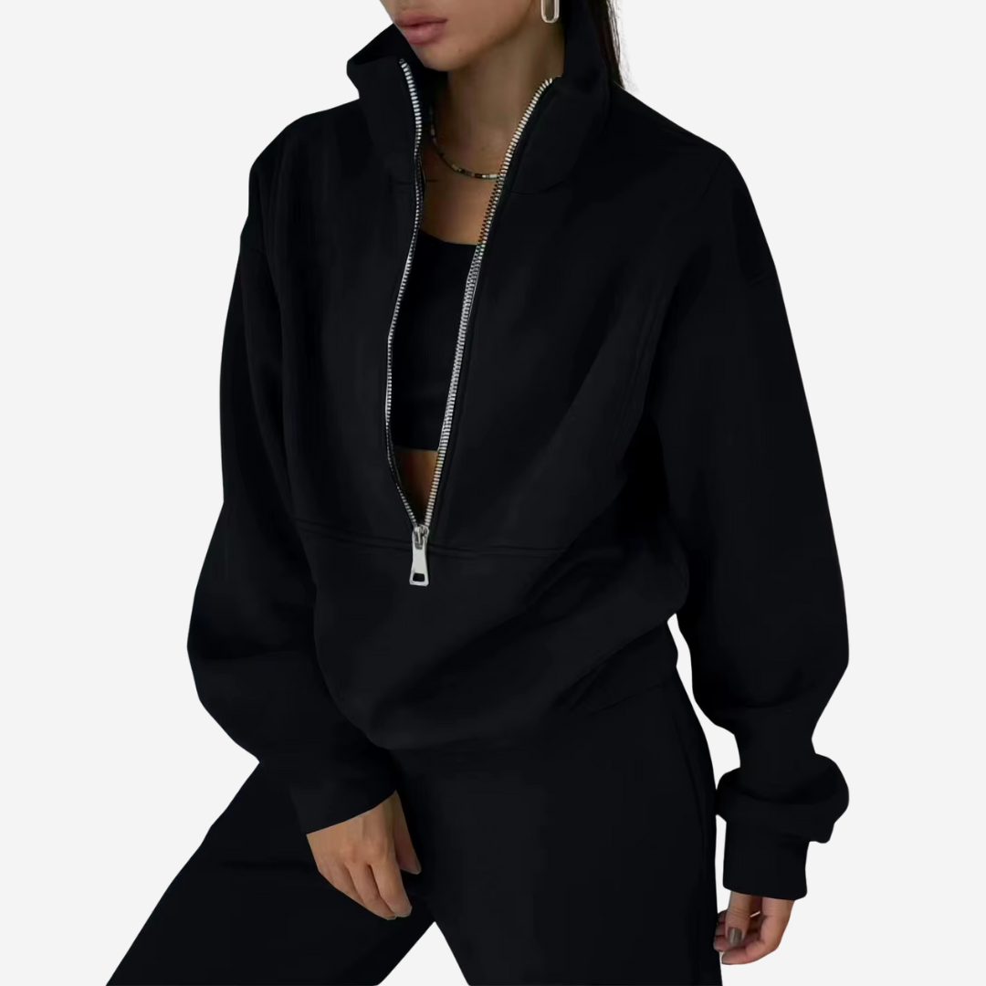"Dames tweedelig trainingspak: elegante sweater, hoge taille broek, comfortabele pasvorm, ideaal voor casual stijl."