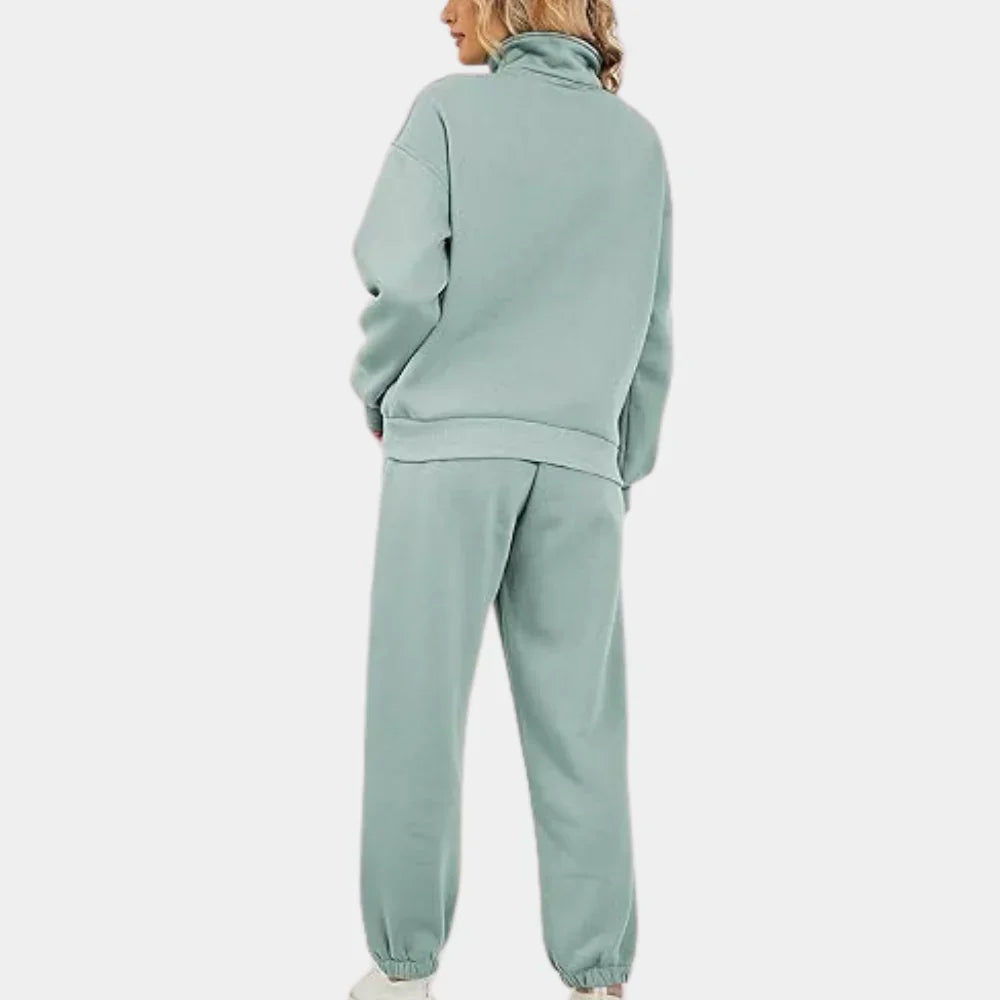 "Dames tweedelig trainingspak: elegante sweater, hoge taille broek, comfortabele pasvorm, ideaal voor casual stijl."