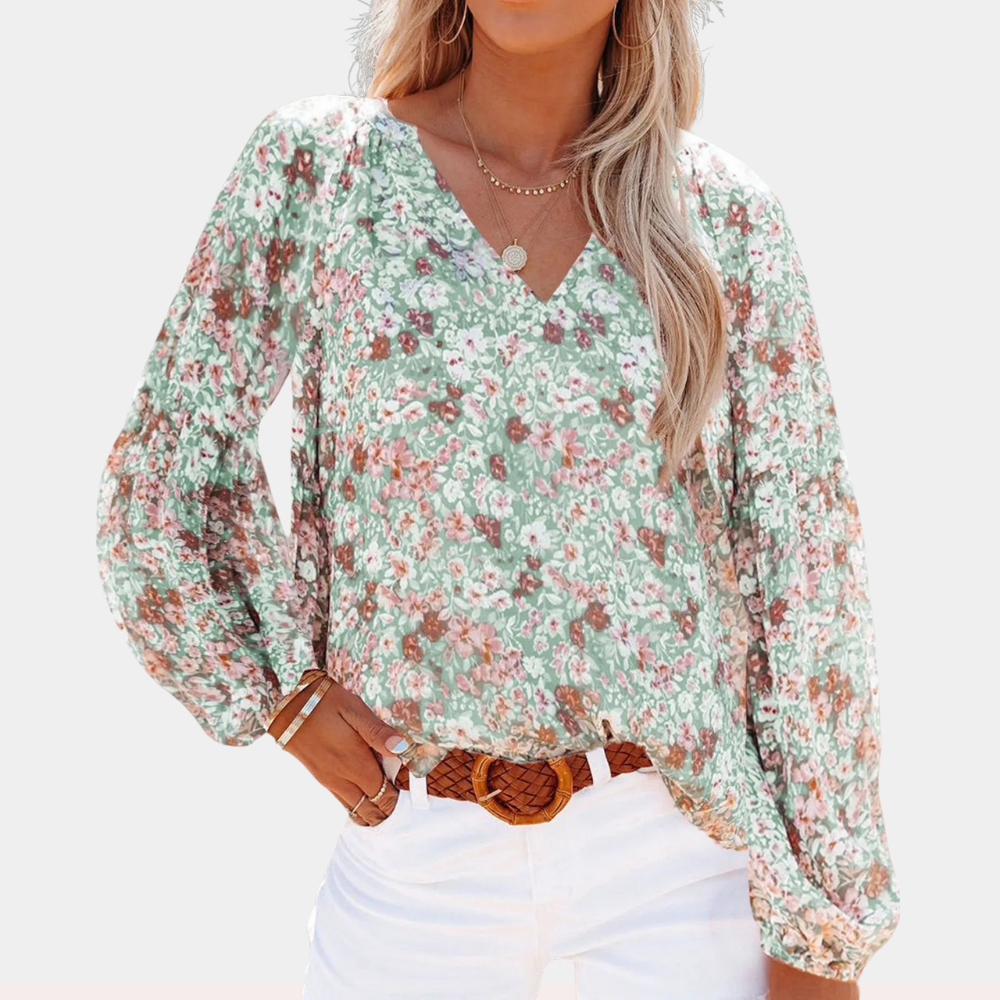 "Damesblouse met lange mouw en bloemenprint, ideaal voor de zomer, elegante look in roze, wit of groen."