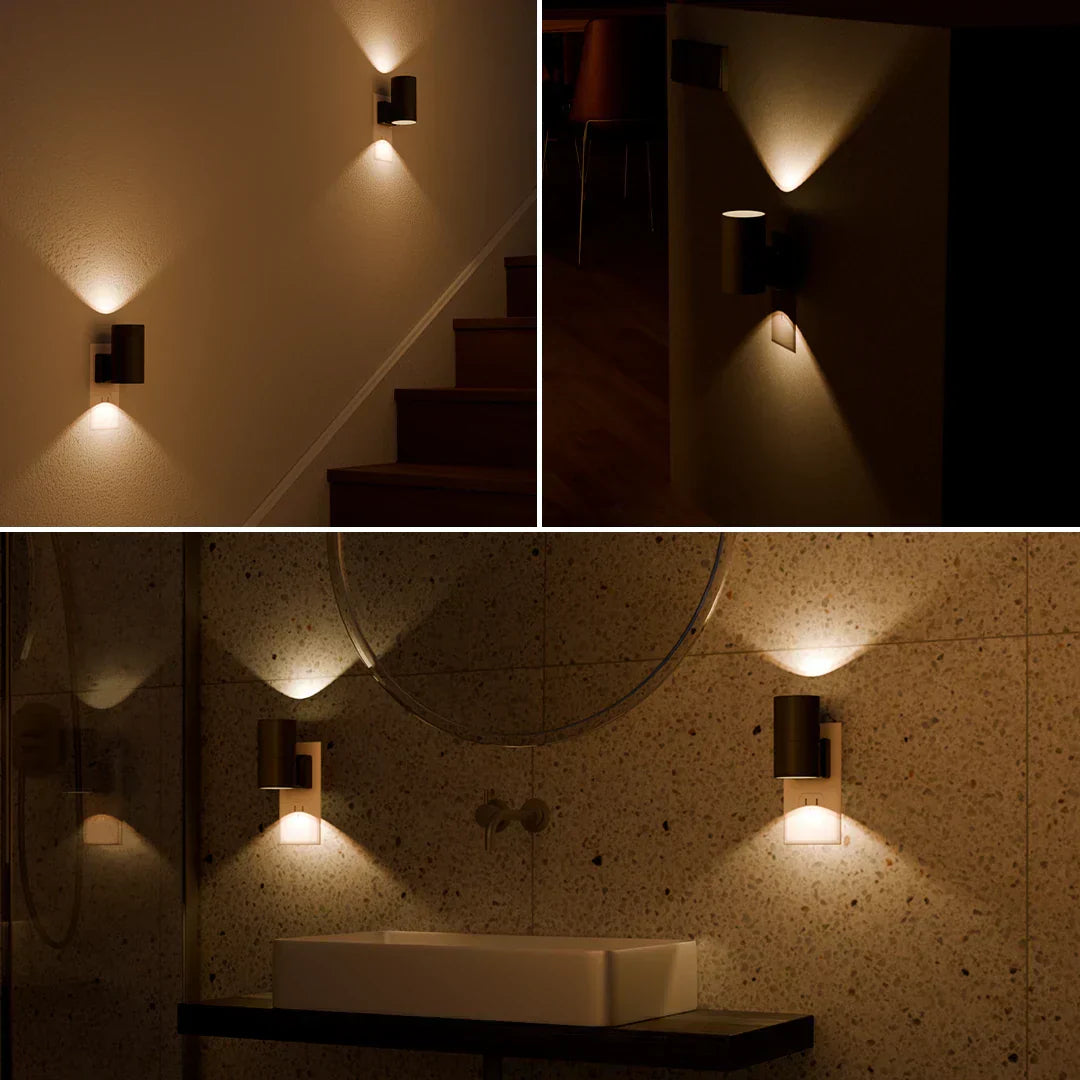 "Dimbare LED nachtlamp, zwart/wit, elegant design met dag-nachtsensor. Past in elk stopcontact voor warme, rustgevende gloed.