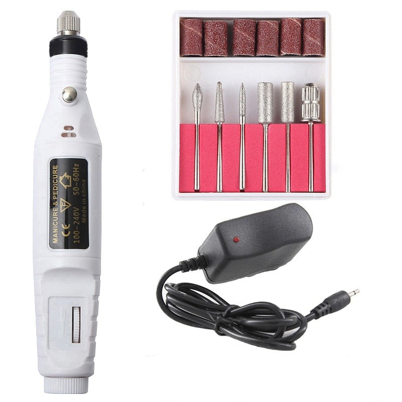 "Draagbare 6-in-1 elektrische nagelvijlset voor manicure en pedicure, inclusief 6 opzetstukjes, roze uitvoering."