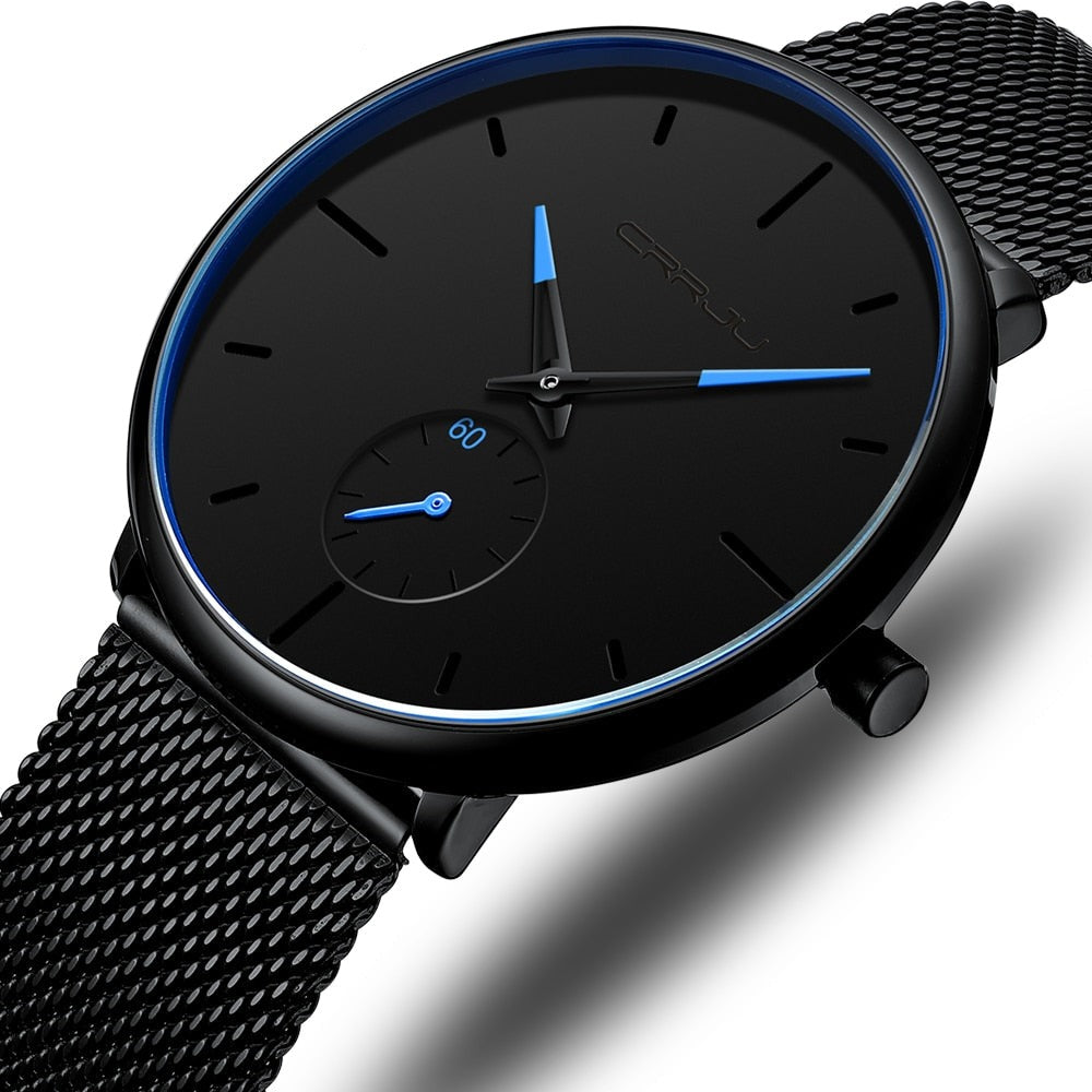 "Dun minimalistisch herenhorloge met elegante zwarte wijzerplaat, roestvrijstalen mesh-band en luxe uitstraling."
