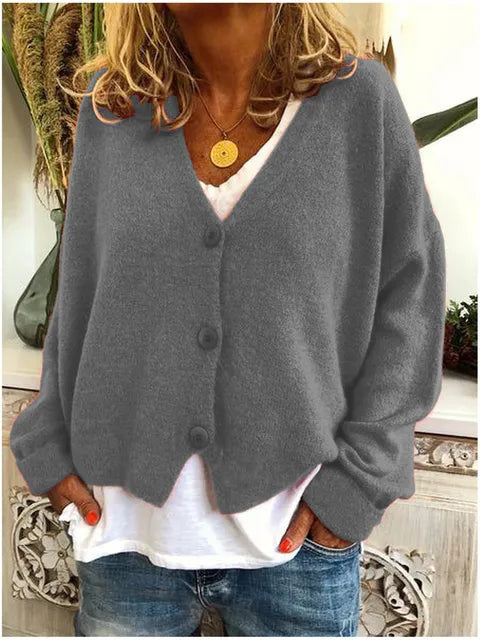 "Elegant katoenen dames vest met knopen, tijdloze stijl, zacht textuur, lange mouwen, perfect voor elke gelegenheid."