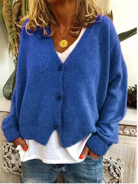 "Elegant katoenen dames vest met knopen, tijdloze stijl, zacht textuur, lange mouwen, perfect voor elke gelegenheid."