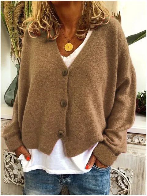 "Elegant katoenen dames vest met knopen, tijdloze stijl, zacht textuur, lange mouwen, perfect voor elke gelegenheid."
