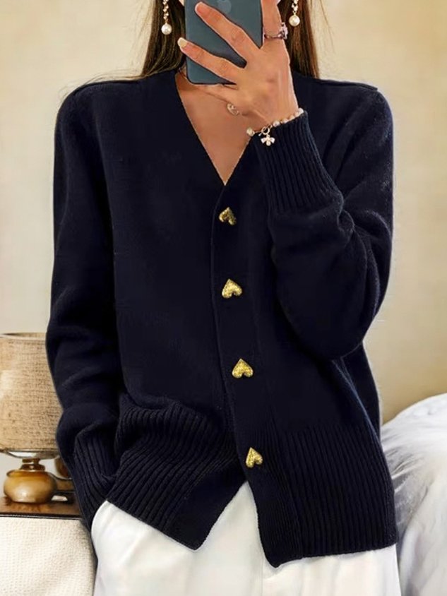 "Elegant, klassiek damesvest met V-hals in effen design. Perfect voor casual en formele stijlen, warm en comfortabel."