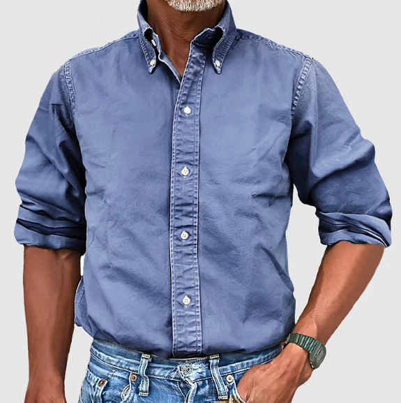 "Elegant klassiek Levi overhemd voor mannen, blauw katoenen stof, geschikt voor zowel zakelijke als informele gelegenheden."