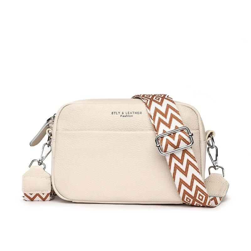 Elegante bruine leren crossbody damestas met verstelbare riem, perfect voor dagelijks gebruik; stijlvol en functioneel design