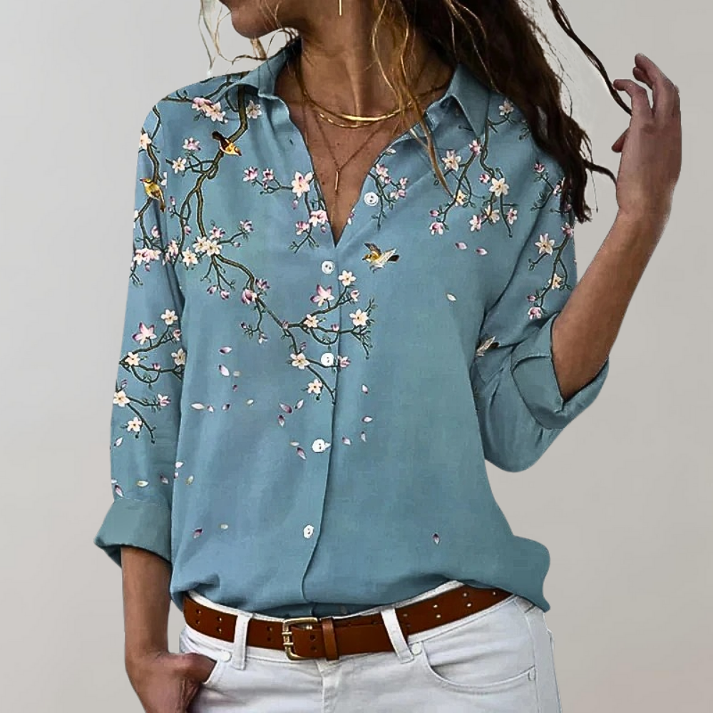 "Elegante damesblouse in gouddkleur, subtiele slim fit, katoenen mix, ideaal voor zowel chique als casual gelegenheden."