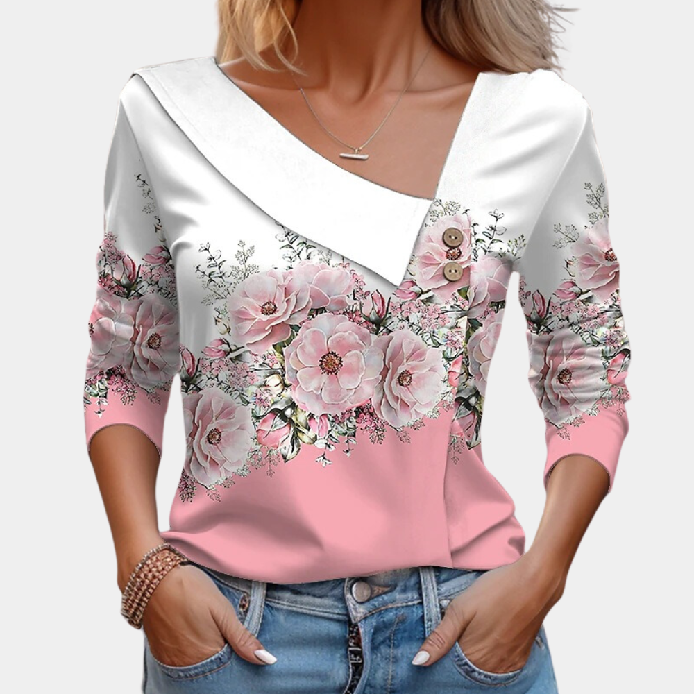 "Elegante damesblouse met bloemenpatroon in bruin, asymmetrisch design, geschikt voor casual en formele gelegenheden."