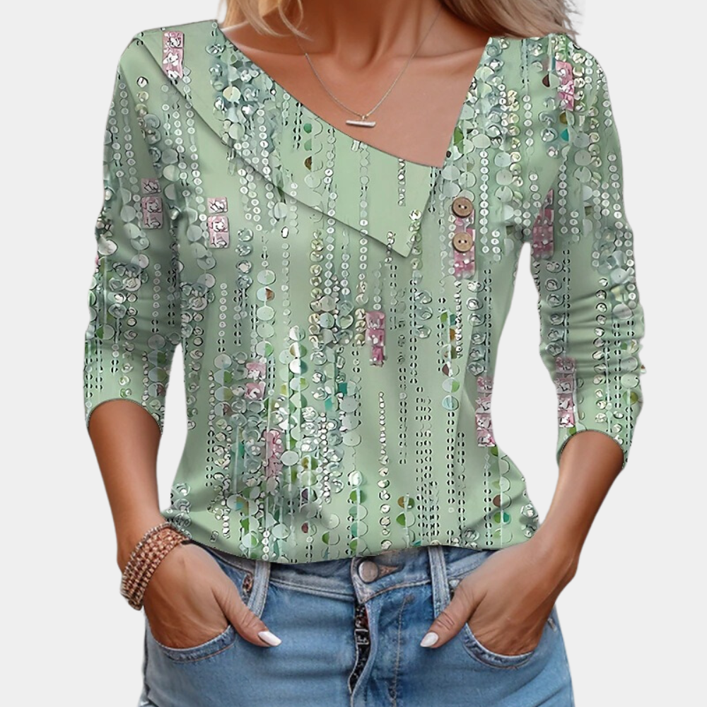 "Elegante damesblouse met bloemenpatroon in bruin, asymmetrisch design, geschikt voor casual en formele gelegenheden."