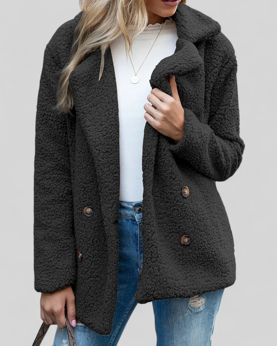 "Elegante damesjas Genevieve, zacht en tijdloos design, diverse kleuren, geschikt voor casual en formele gelegenheden."