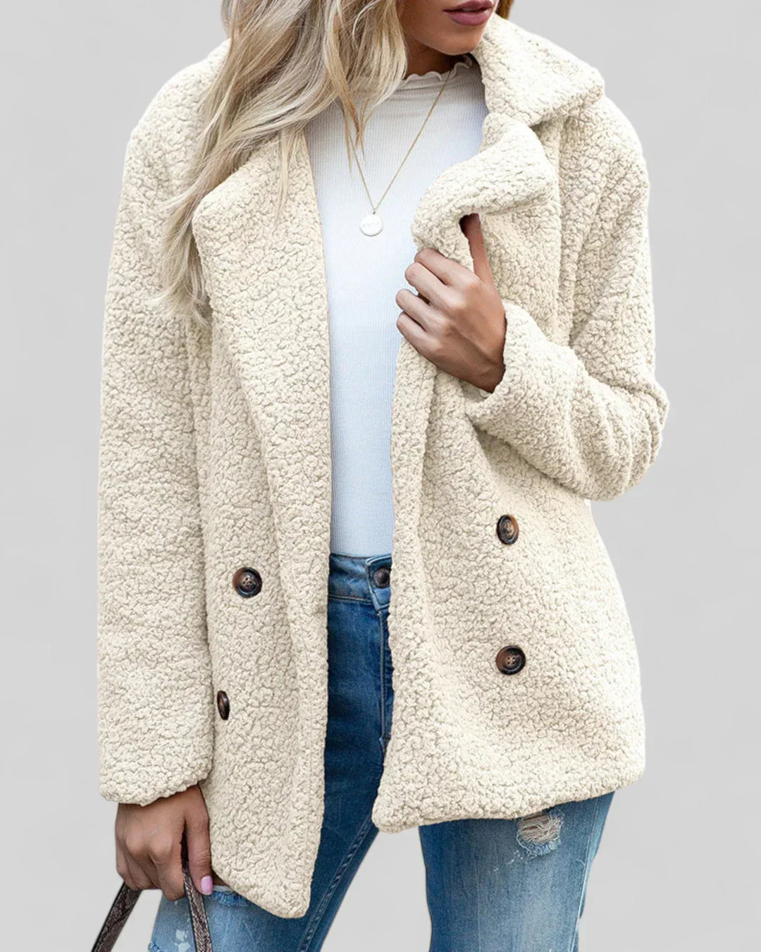"Elegante damesjas Genevieve, zacht en tijdloos design, diverse kleuren, geschikt voor casual en formele gelegenheden."
