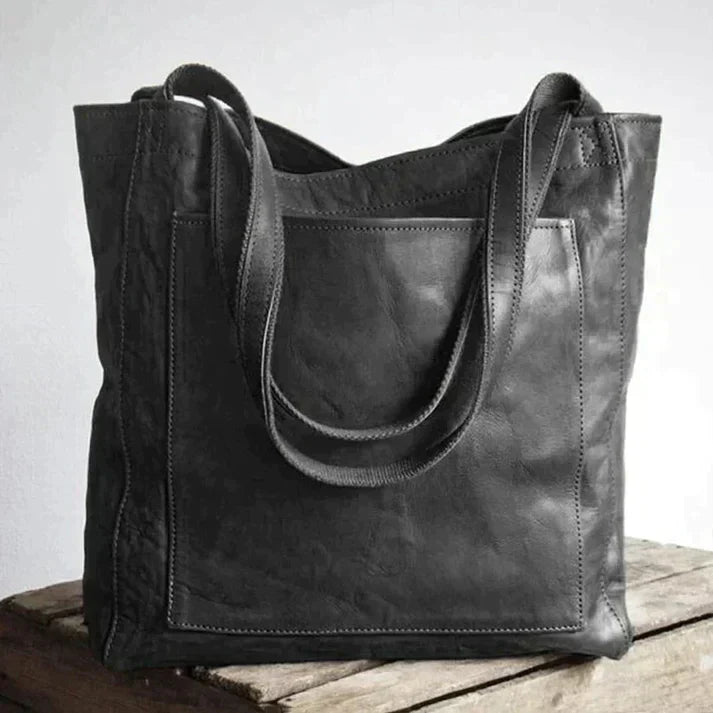"Elegante grote leren damestas voor vrouwen, bruine schoudertas met ruime opbergruimte en tijdloos ontwerp."