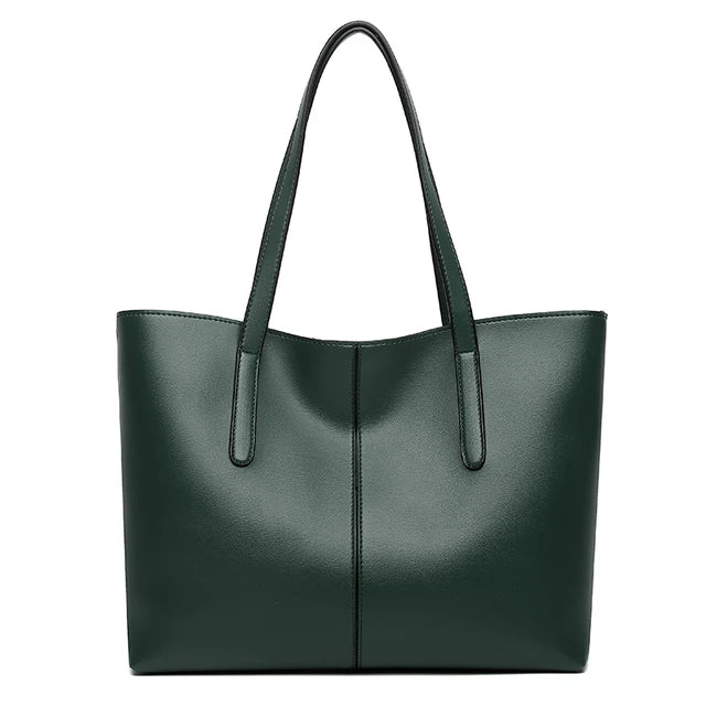 Elegante leren schoudertas in rood, met verstelbare riem en ruim interieur, perfect voor dagelijkse organisatie en stijl.