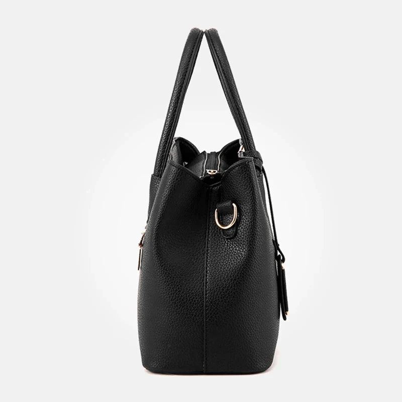 Elegante leren schoudertas voor dames, stijlvol en ruim, met verstelbare riem en verschillende kleurkeuzes.