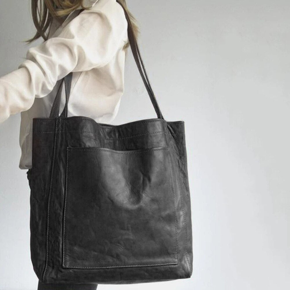Elegante, leren tas voor dames, chique uitstraling, vlekbestendig interieur, perfecte toevoeging aan elke garderobe.