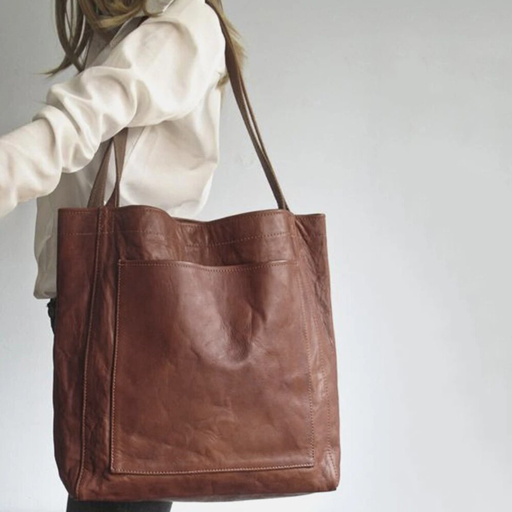 Elegante, leren tas voor dames, chique uitstraling, vlekbestendig interieur, perfecte toevoeging aan elke garderobe.