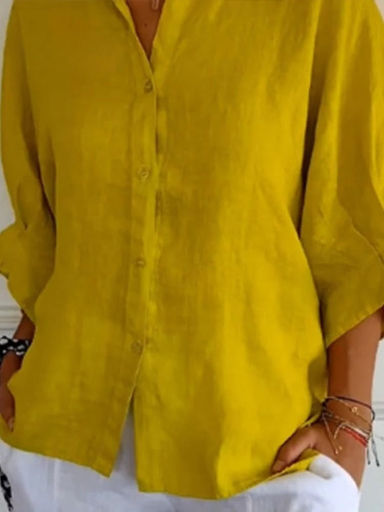 "Elegante linnen damesblouse met V-hals en strikje, luchtige katoen-linnenmix, vrouwelijk silhouet, veelzijdig design."