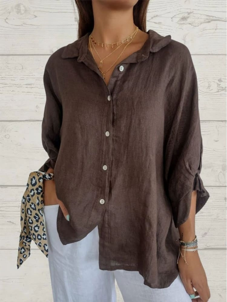 "Elegante linnen damesblouse met V-hals en strikje, luchtige katoen-linnenmix, vrouwelijk silhouet, veelzijdig design."