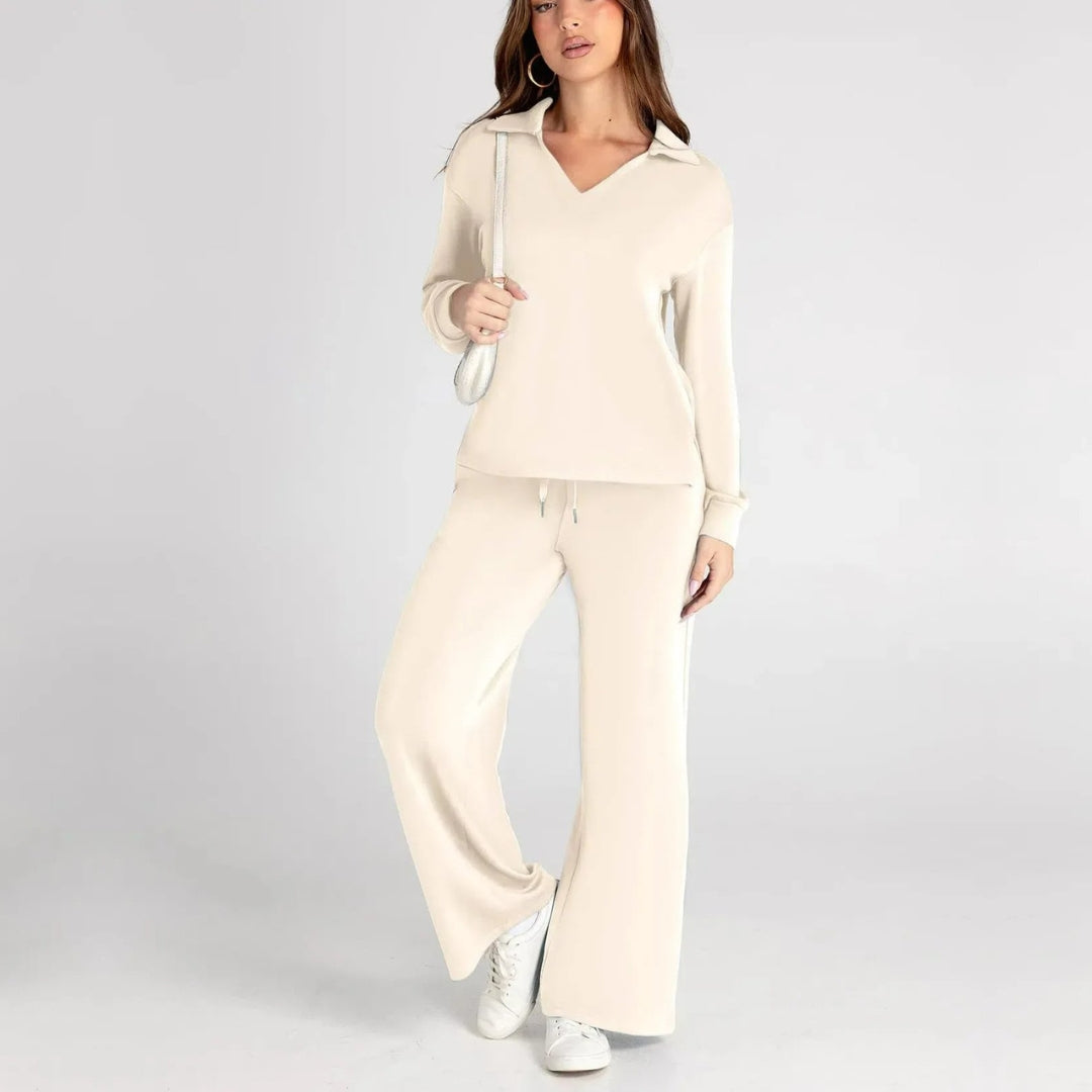 "Elegante loungewear set voor dames met off-shoulder sweater en perfect passende broek, trendy en comfortabel zichtbaar."