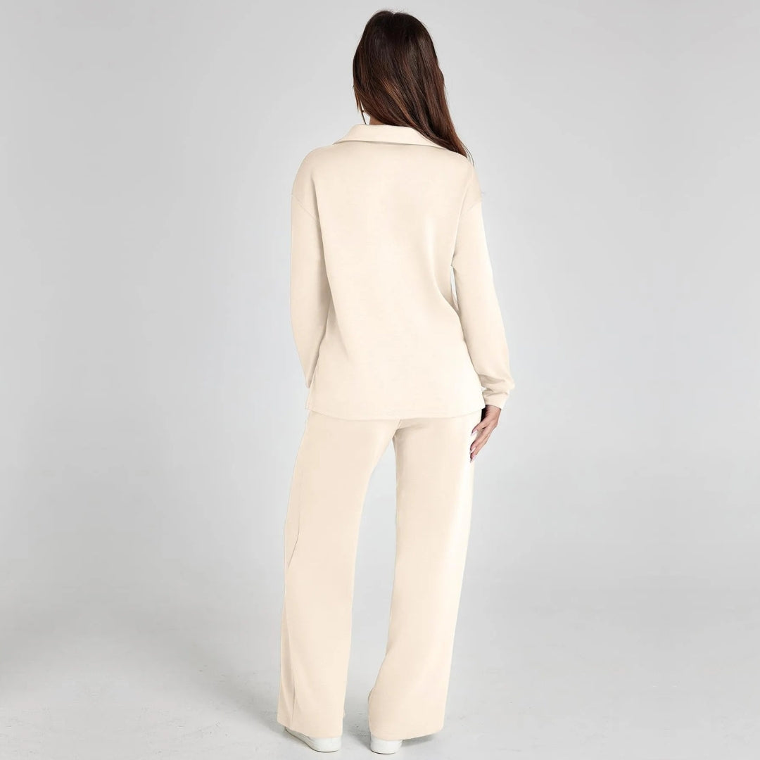 "Elegante loungewear set voor dames met off-shoulder sweater en perfect passende broek, trendy en comfortabel zichtbaar."