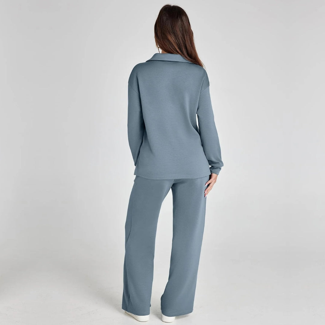 "Elegante loungewear set voor dames met off-shoulder sweater en perfect passende broek, trendy en comfortabel zichtbaar."