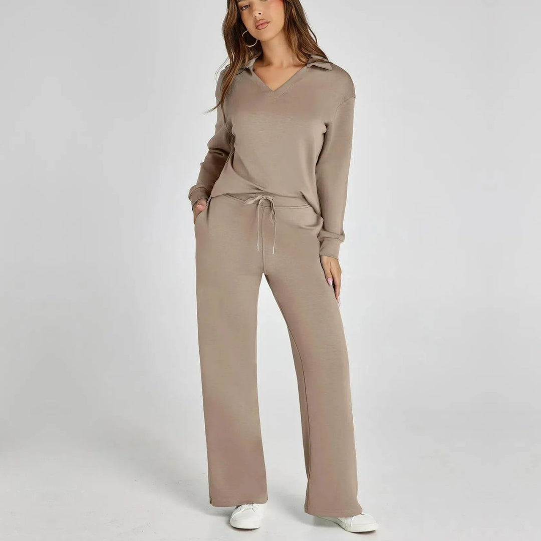 "Elegante loungewear set voor dames met off-shoulder sweater en perfect passende broek, trendy en comfortabel zichtbaar."