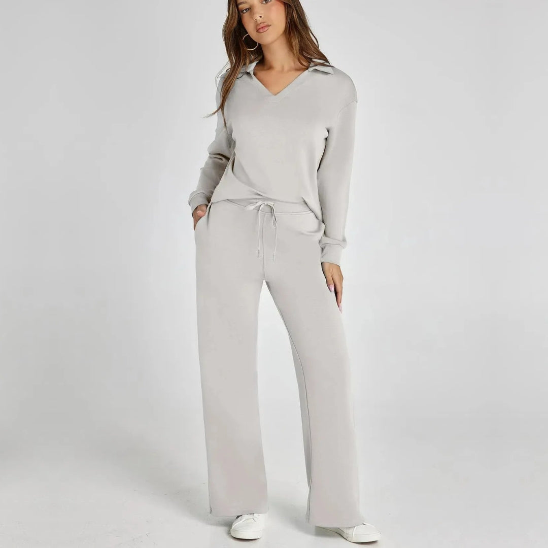 "Elegante loungewear set voor dames met off-shoulder sweater en perfect passende broek, trendy en comfortabel zichtbaar."