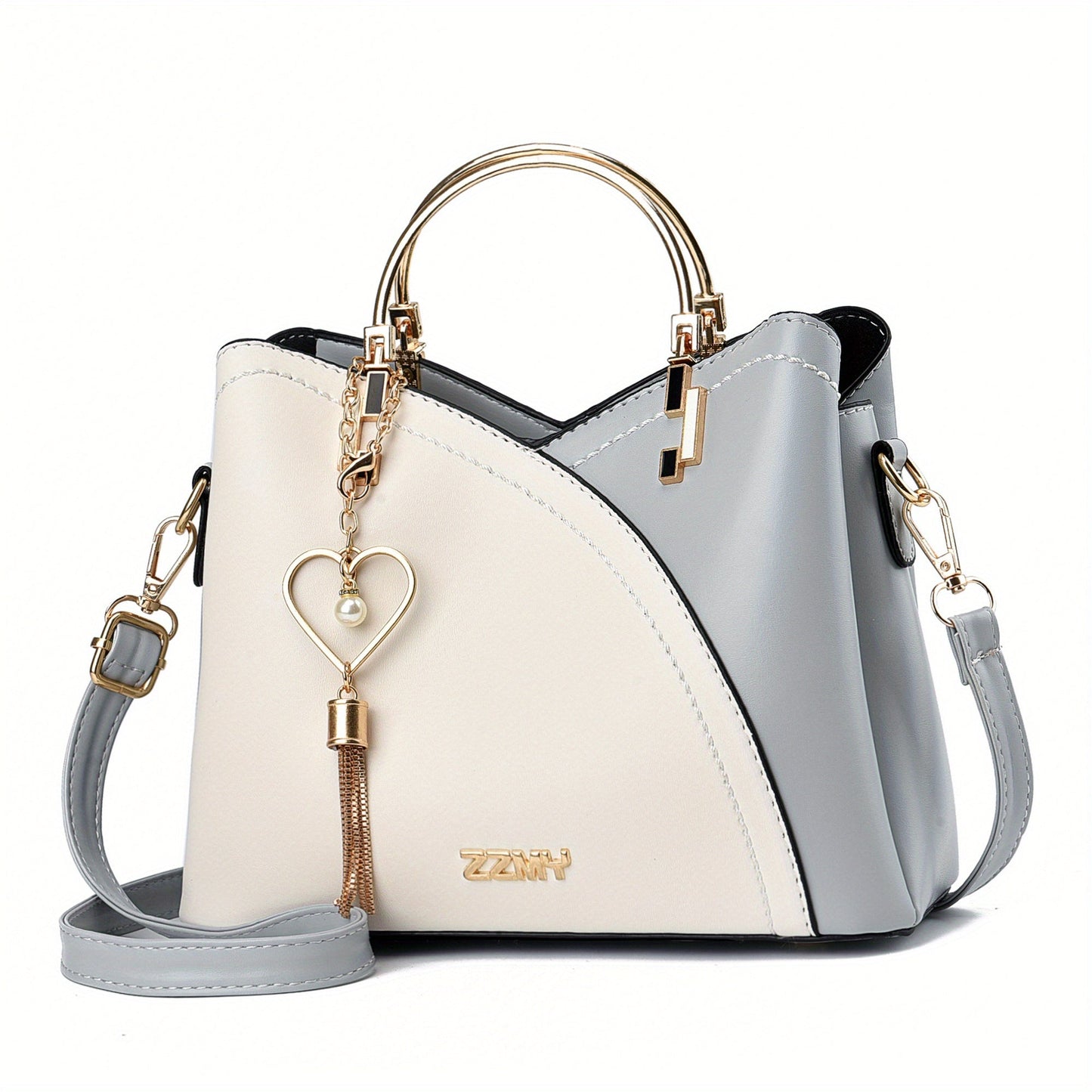 "Elegante luxe leren handtas met stijlvol kleurblokontwerp en kwastjes, perfect voor de moderne vrouw, frontaal gezien."