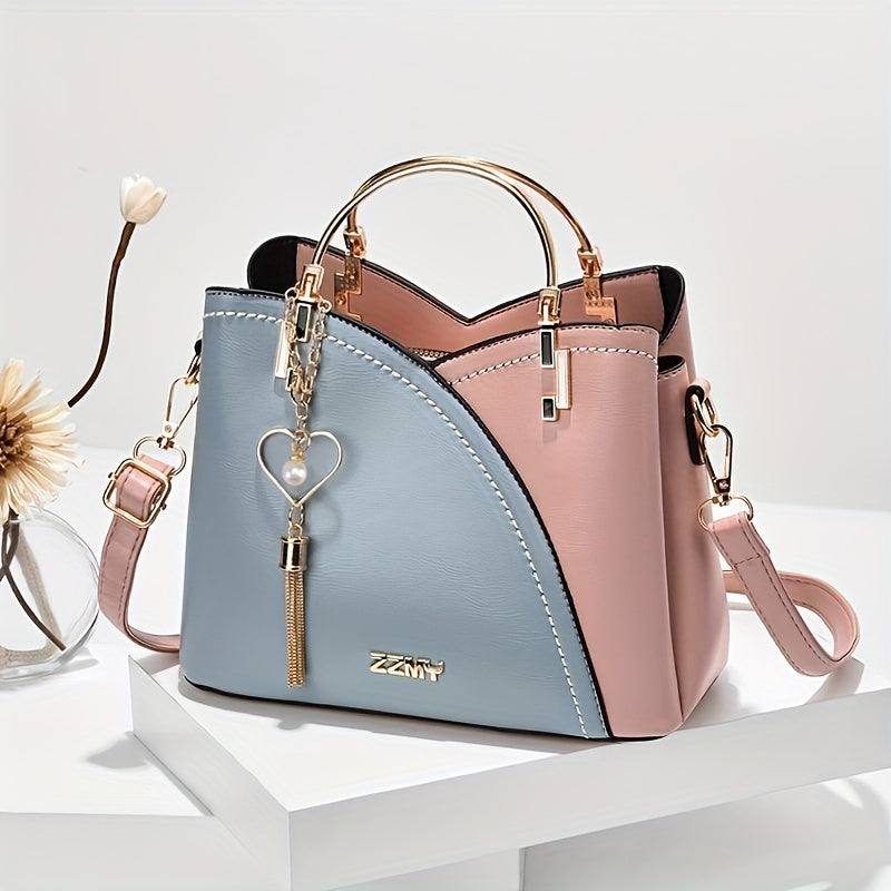 "Elegante luxe leren handtas met stijlvol kleurblokontwerp en kwastjes, perfect voor de moderne vrouw, frontaal gezien."