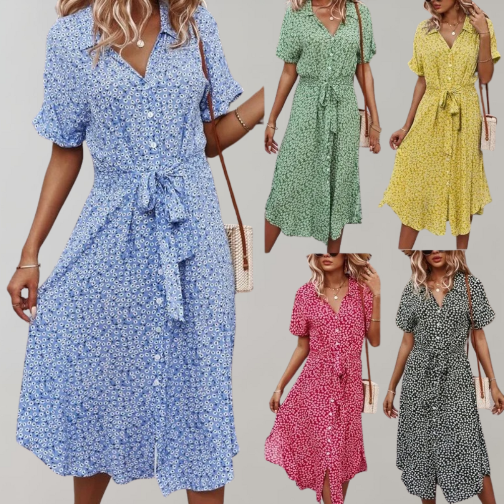 "Elegante midi zomerjurk met bloemenprint en korte mouwen, perfect voor damesmode in zowel casual als formele settings."