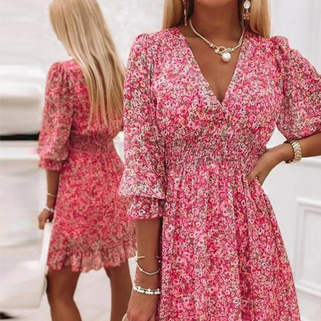 "Elegante midi zomerjurk voor dames met korte mouwen en V-hals, beschikbaar in roze, blauw en groen."