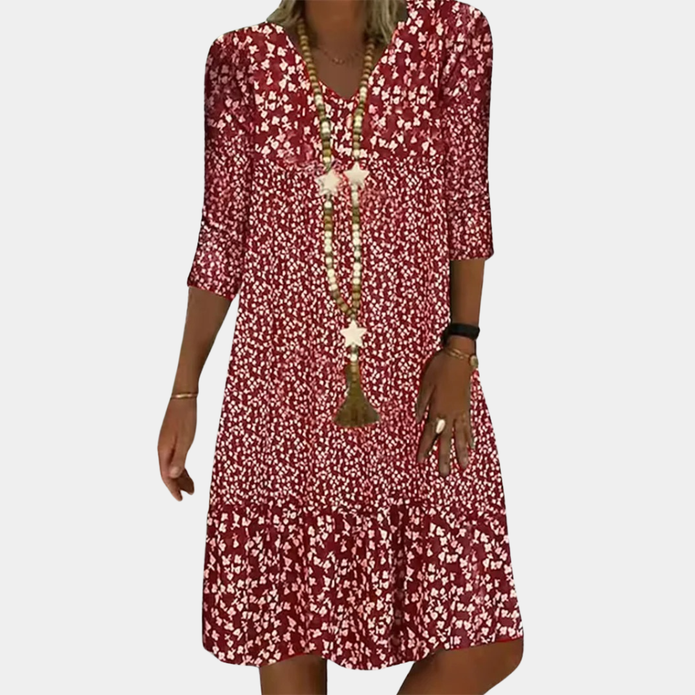 "Elegante midi zomerjurk voor dames met V-hals en korte mouwen, ideaal voor warme dagen in blauw, groen, bruin of rood."